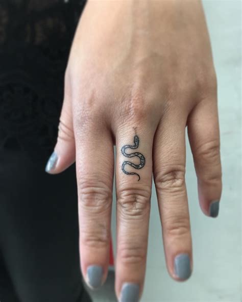 Small Snake Finger Tat Trendy Tattoos Finger Tattoo Designs