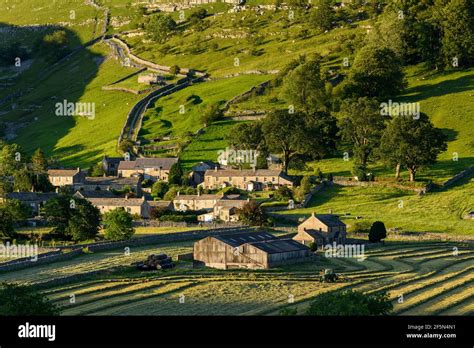 Picturesque Dales Valley And Tiny Village Houses Barn Farmland Fields