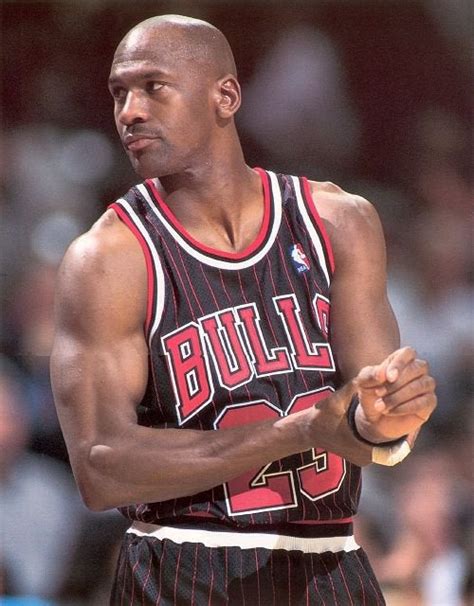 Michael Jordan In The Black Uniform With Red Pinstripes Introduced In