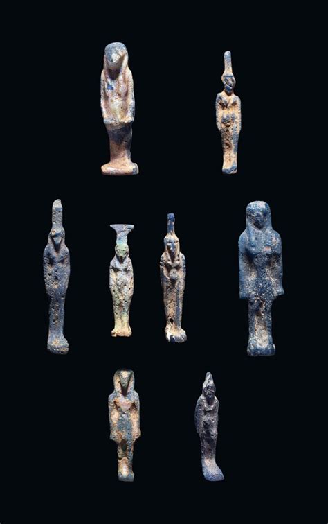 Eight Egyptian Blue Glass Deity Amulets