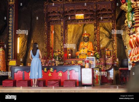 Woman Worship To The God At At The Altar Inside A Chinese Temple Wishing For Properity For The