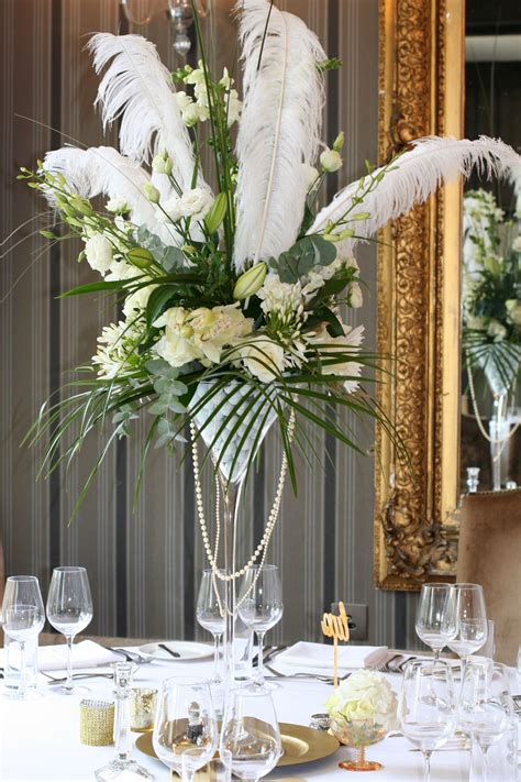 Centrepiece With Feathers For A 1920s Wedding At The Greenway Hotel By