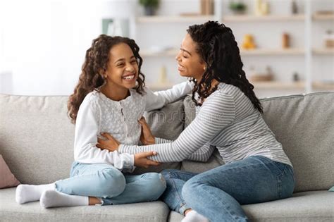 cheerful black mother and daughter having fun together at home stock image image of happy