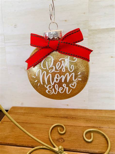 Some moms run marathons, others run companies, and still others run around town, ferrying offspring from their violin lessons to tae kwon do classes to softball practice. Custom Best Mom Ever Glitter Christmas Ornament / Mom Gift ...