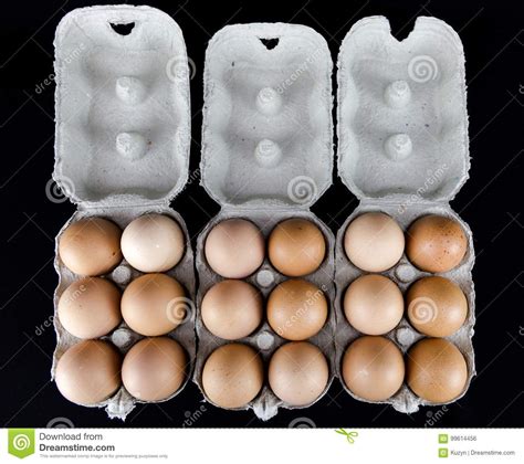 One And Half Dozen Of Light Brown Eggs In Cardboard Boxes Stock Photo