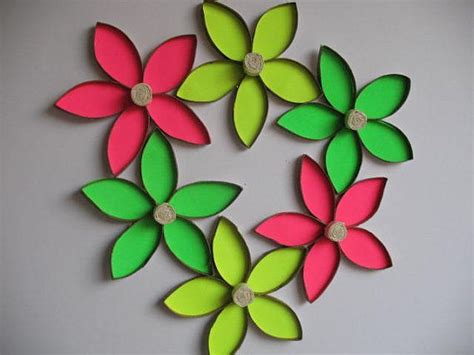 We made a similar toilet paper roll butterfly not so long ago and together with this flower, they make a great pair for a crafting session. Recycle wall flower art / Upcycled Toilet Paper Rolls/ by ...