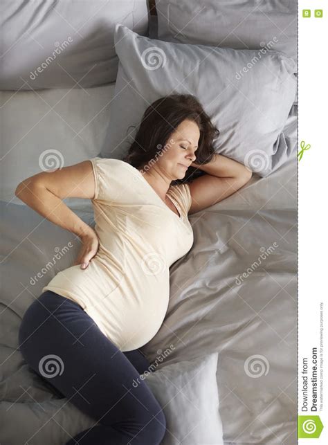 Pregnant Woman Relaxing At Home Stock Image Image Of Uncomfortable Emotions 78657537