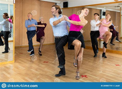 Cheerful Man And Woman Practicing Ballroom Dances In Ballroom Stock Image Image Of Stylish