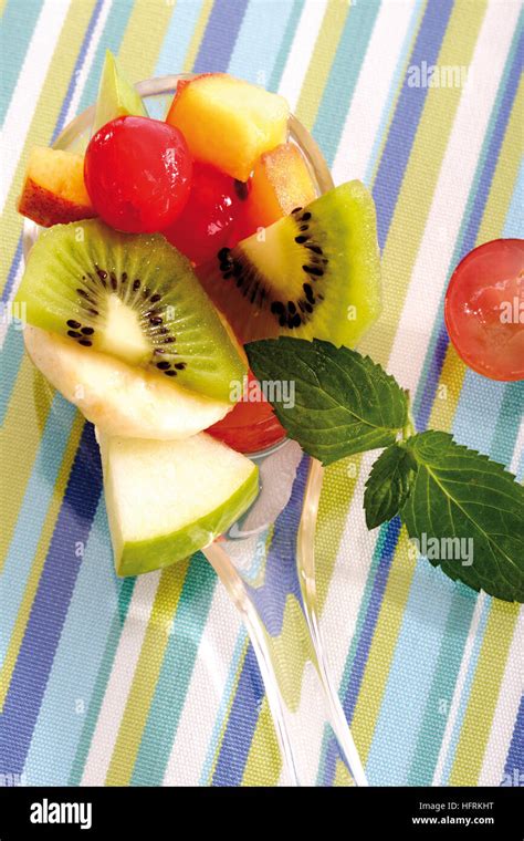 Fruit Salad Kiwis Grapes Apples Bananas Mangoes And Cherries Stock