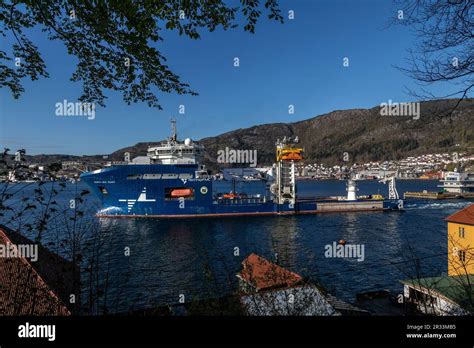 Offshore subsea construction vessel North Sea Giant departing from port