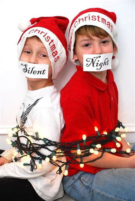 Fun Christmas Card Pose Of Kids In Santa Hats With Christmas Lights