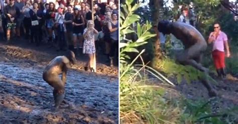 Naked Festival Dancer Covered In Mud Takes Embarrassing Tumble As