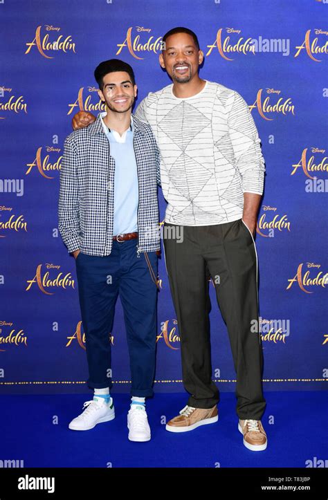 Mena Massoud And Will Smith Attending A Photocall For Aladdin Held At The Rosewood Hotel In