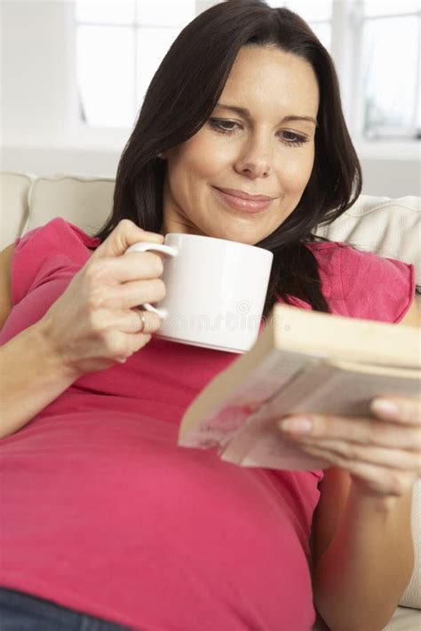 Pregnant Woman Drinking Hot Drink Reading Book Home Stock Photos Free Royalty Free Stock