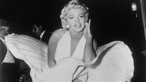 marilyn monroe auction featuring iconic white dress earns 1 6m
