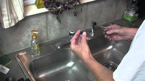 The handle becomes loose after the use of a few months and starts leaking at the base. Moen Kitchen Faucet Broken Lever Handle Repair - YouTube