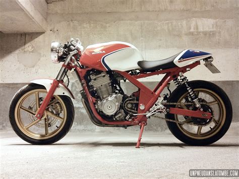 You can download these videos from youtube for free on wikibit.me. La Honda CB 500 cafe-racer de Romain... Une belle moto-école