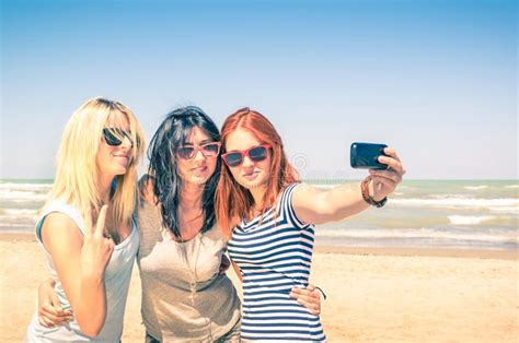 Group Of Girlfriends Taking A Selfie At The Beach Stock Image Image Of Friends Flag 42679981