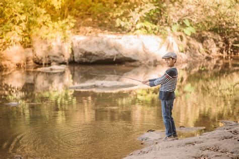 Premium Photo Little Asian Boy Fishing At The River Vintage Retro