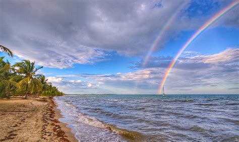 Catching A Double Rainbow Sunset While In Hopkins Belize