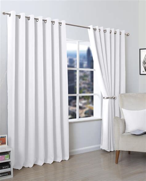 The subtle colours are elevated by the plain white background on. Blackout Eyelet Curtains Set And Cushion Covers | De Lavish