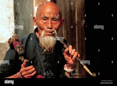 Old Man Smoking With Smoking Pipe Yangshuo China Stock Photo Alamy