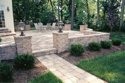 The Patio Design Included A Raised Patio With A Custom Walkway Sitting