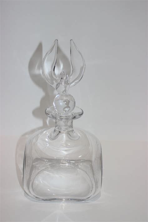 Decant a younger wine to increase never twist the base and bowl. Steuben Crystal Eagle Decanter For Sale at 1stDibs