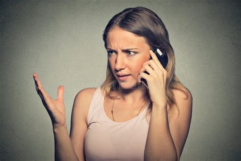 upset angry skeptical unhappy serious woman talking on mobile phone stock image image of