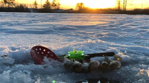 First Ice Ice Fishing For Russian Bass Russia Youtube