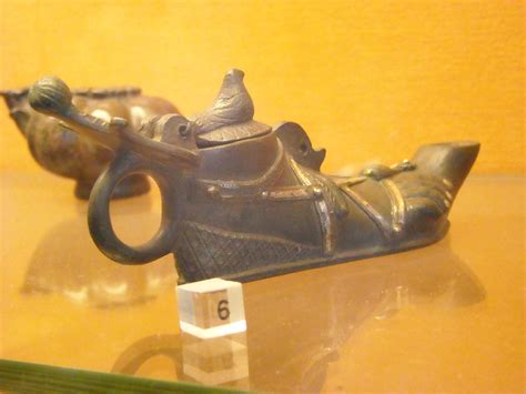 bronze oil lamp as shoe from pompeii 79 ad naples archaeological museum lighting in