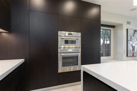 River white granite with white cabinets, white carrara marble backsplash and white ceramic arabesque tiles and costen floor. Summit Ridge Ultra-Modern Kitchen - Modern - Kitchen ...