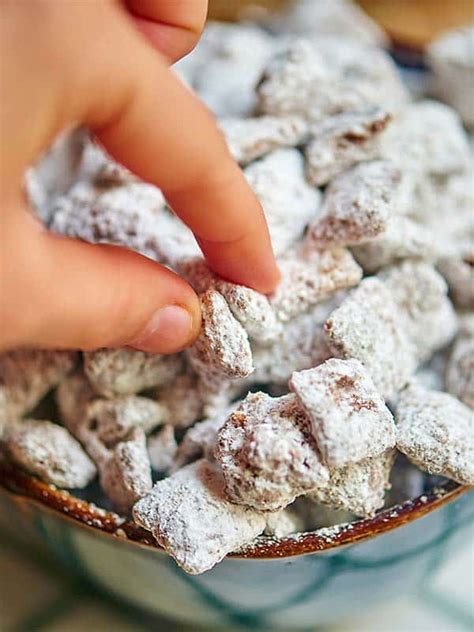 Christmas puppy chow recipe is a family tradition around here. Best Puppy Chow Recipe (aka Muddy Buddies) - Show Me the Yummy