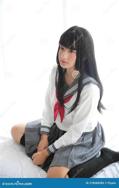 portrait japanese school girl sitting in white tone bedroom stock image image of hand room