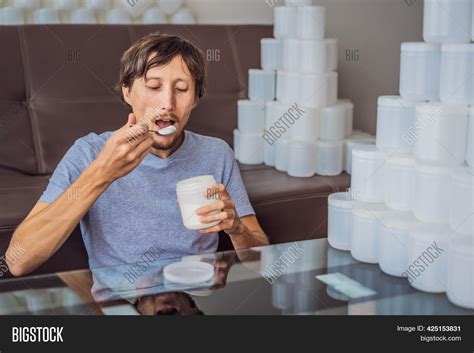 Man Eats Yogurt Image And Photo Free Trial Bigstock