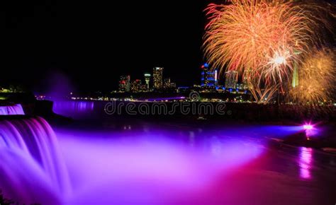 Niagara Falls Night Time Illuminated With Fireworks Editorial
