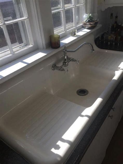 This Beautiful Cast Iron Double Drainboard Sink With Wall Mounted