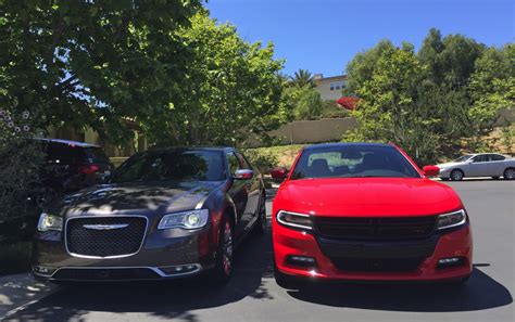 Car Wars Chrysler 300c Vs Dodge Charger Which Car Has The Better