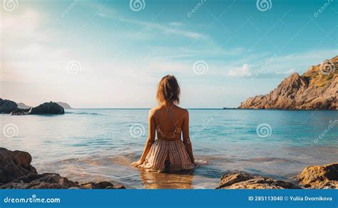 Woman Meditating On The Sea Beach In Lotus Position Generative Ai