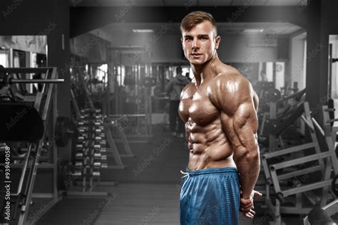 Sexy Muscular Man Posing In Gym Shaped Abdominal Showing Triceps Strong Male Naked Torso Abs