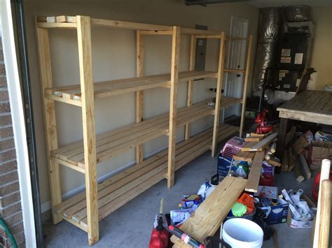 You can build your own garage shelves from scrap 2 x 4s and plywood, ones that will hold all of your tool cases, hardware, batteries, and more. Ana White | Great shelving, easy to do - DIY Projects