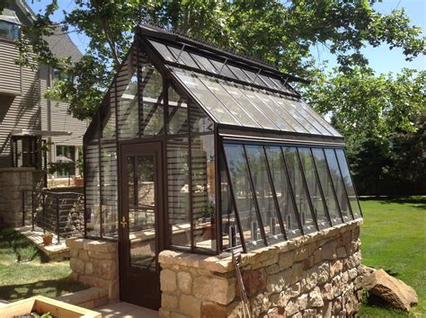 Gorgeous Classic Greenhouse Built On A Stone Wall Greenhouse Stone
