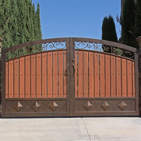 I made this double wood decorative steel gate for a client and it turned out great! Tuscan Composite Wood French Gate with Arch and Kickplate ...