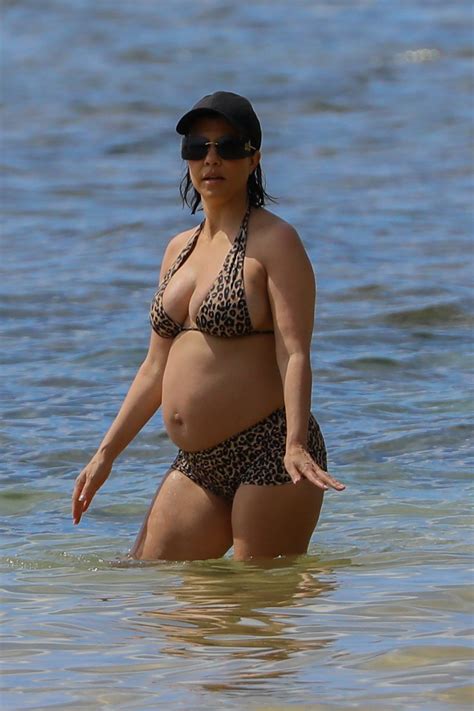 Pregnant Kourtney Kardashian Shows Off Growing Baby Bump In Teeny Leopard Bikini At Beach With