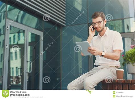 Thoughtful Businessman Multitasking Outdoors Stock Photo Image Of