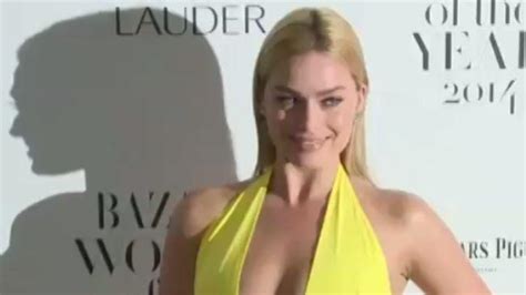 Margot Robbie Stuns In Plunging Yellow Gown At Harpers Bazaar Women Of The Year Awards News