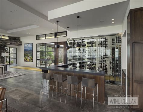 Make a statement with a custom wine wall complete with glass doors, temperature control, and floating racks. Contemporary & Modern Design | Innovative Wine Cellar Designs