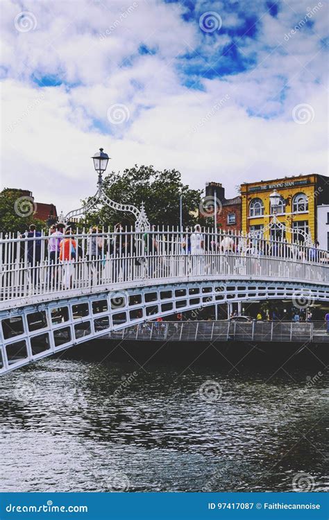 The Historical Ha`penny Bridge Over The River Liffey In Dublin