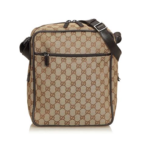 Ce sac a la mode est adapte a presque toutes les occasions. Sacs à main Gucci Sac bandoulière en toile Guccissima Cuir ...
