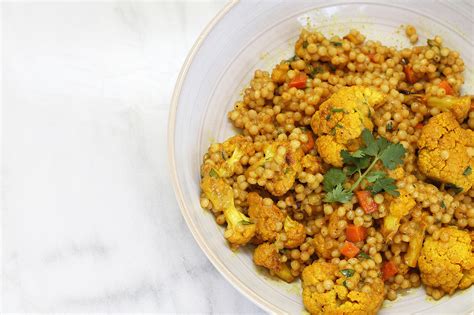 These little pearls of hardy goodness were first introduced for the amateur cook, israeli couscous is a real treasure. Curried Couscous + Roasted Cauliflower Salad Vegan